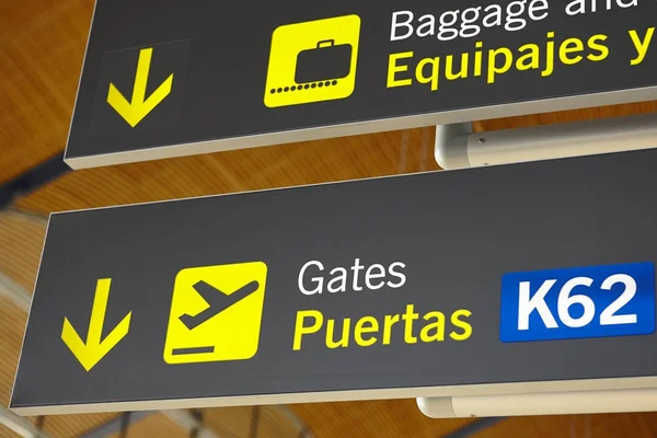 Airport flight arrival gates info display on spanish language