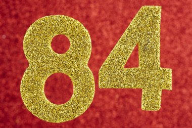 Seksen dört sarı renk kırmızı bir arka plan üzerinde numara. Anniversa