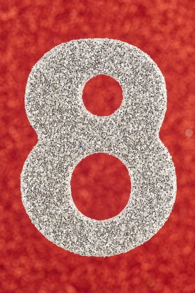 Number eight silver color over a red background. Anniversary. Ve — Stock Photo, Image