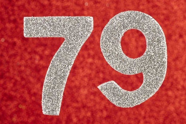 Number seventy-nine silver color over a red background. Annivers — Stock Photo, Image