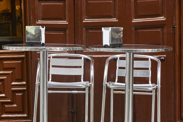 Classic spanish coffee shop. Metallic tables and chairs. Tapas — Stock Photo, Image