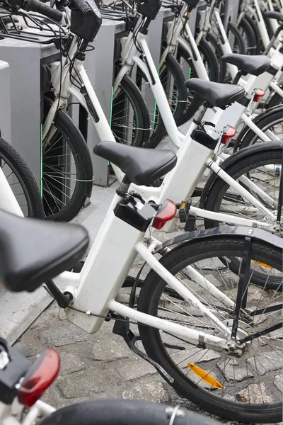 Charging electric bikes in the city. Urban green transportation — Stock Photo, Image