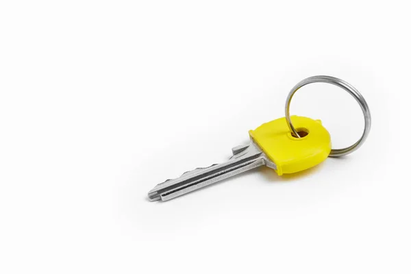 Key ring with keys over white background. Rent — Stock Photo, Image