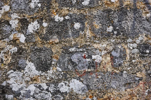 Zvětralé zdi kamenné texturou grunge. Přírodní žula pozadí — Stock fotografie