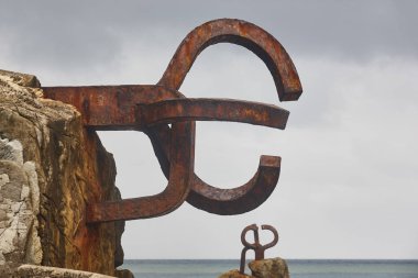 Donostia coastline landmark rock formations. Peine del viento. S clipart