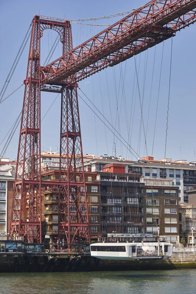 Bizkaia red iron hanging bridge and Nervion river. Basque countr — Stock Photo, Image