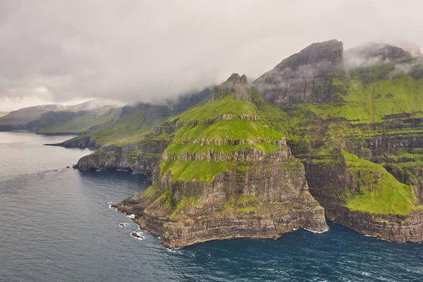 Faroe islands dramatic coastline viewed from helicopter. Vagar f — Stock Photo, Image