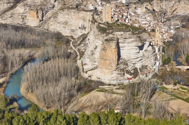 Picturesque white village on the mountain. Alcala del Jucar. Spain