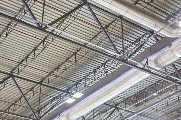 Warehouse building roof stainless air pipes. Climate ventilation structure equipment