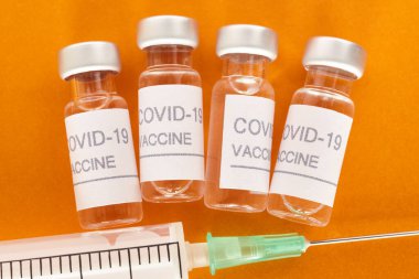 Covid-19 aşı tüpleri. Coronavirus salgını enfeksiyonu. Küresel önleme aşısı