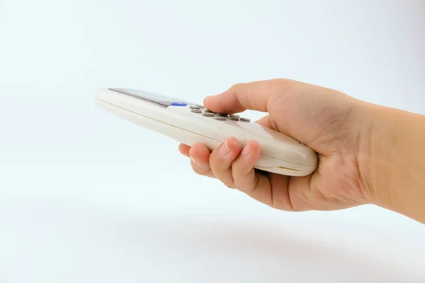 Close up hand women using remote controller open The air conditi Royalty Free Stock Images