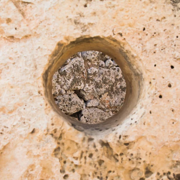 A hole in a stone — Stock Photo, Image