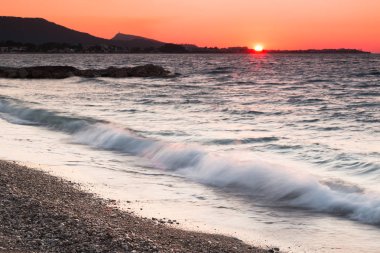 gün batımı üç kumsalda
