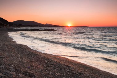 gün batımı beş kumsalda