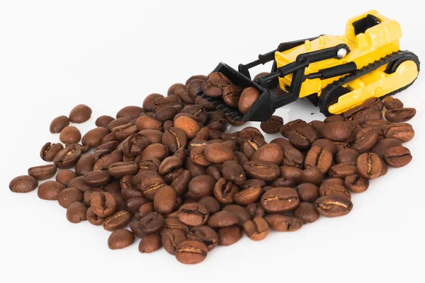 Kaffeebohnen und Bulldozer drei — Stockfoto