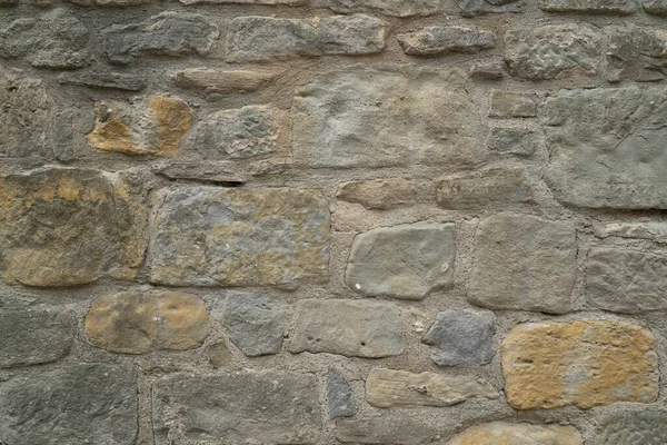 Textura de pared de piedra natural. Albañilería medieval. Antigua pared. Pared de ladrillo. Textura macro. Arquitectura medieval. Albañilería áspera. Textura de fondo . — Foto de Stock