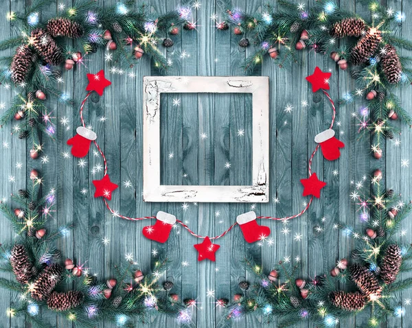 Kerstmis achtergrond met fotolijstjes, verlichting, gloeiende sta — Stockfoto