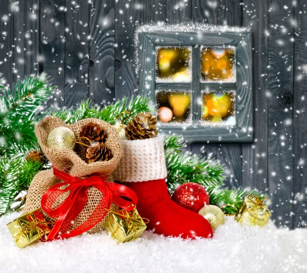 Christmas card with Santa boot and glowing lights — Stock Photo, Image