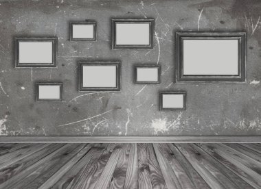 İç boş fotoğraf çerçeveleri grungy duvar adam üzerinde dizi