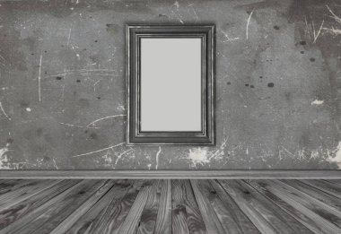 İç ile aşınmış duvar arka plan üzerinde boş fotoğraf çerçevelemek