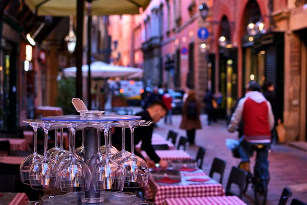 Typical Italian restaurant always prepared for guests with couple of wine glasses outside