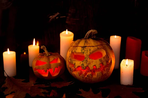 Halloween Pumpa Och Tre Ljus Bakgrund — Stockfoto