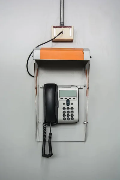 Telefone IP na caixa em um fundo branco — Fotografia de Stock