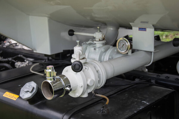 water valves at the rear of a fire engine