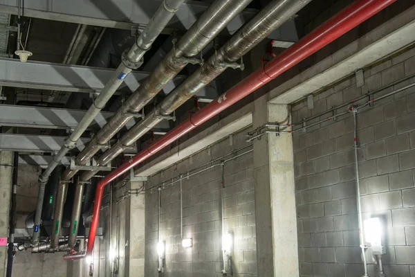 Big pipe under the building — Stock Photo, Image