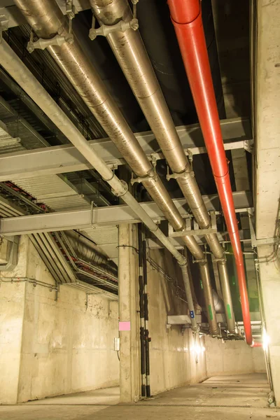 Big pipe under the building. — Stock Photo, Image