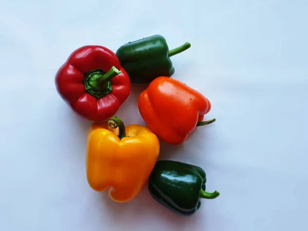 Stock image vegetables and fruits Still Life red paprika green olive sweet pepper salad onion cucumber carrots salt parsley garlic carrots tomatoes zucchini eggplant olive oil bottle radish vegan healthy food