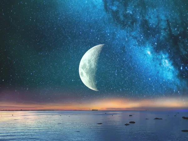 Starry night  moon on blue  sky at sea, sunset at  summer season , sea dark blue water  reflection ,moonlight blue lilac pink   background nature,tropical island , weather ,holiday travel to vacation
