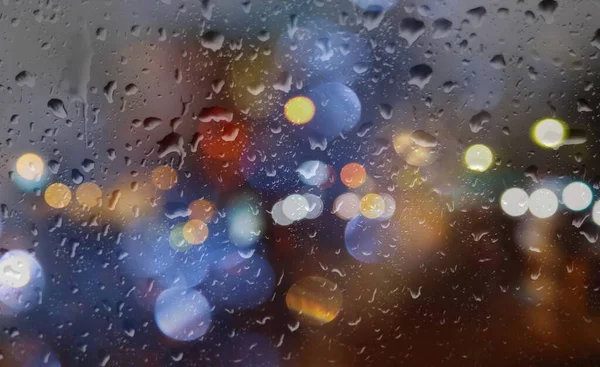 Miasto Noc Zamazane Światło Porze Deszczowej Wieczorem Okna Ulice Deszczem — Zdjęcie stockowe