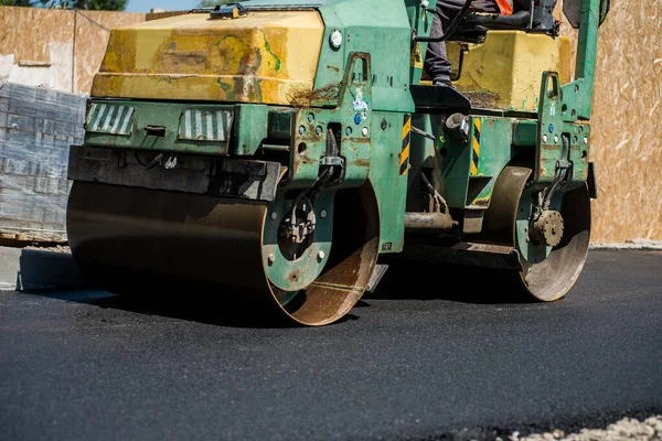 Asphalt lay new workers with tools