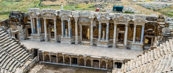 hierapolis, the ancient theater and the whole world of the ancient world, stones and sky