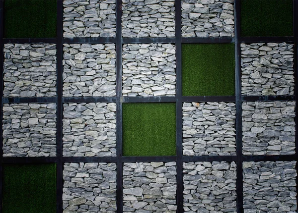 Stone walls and artificial grass — Stock Photo, Image