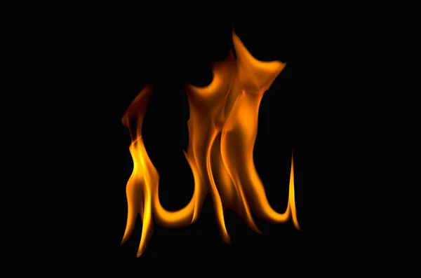 Fire flames on a black background — Stock Photo, Image