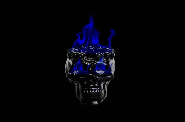 Abstract skull with fire on black background Stock Photo