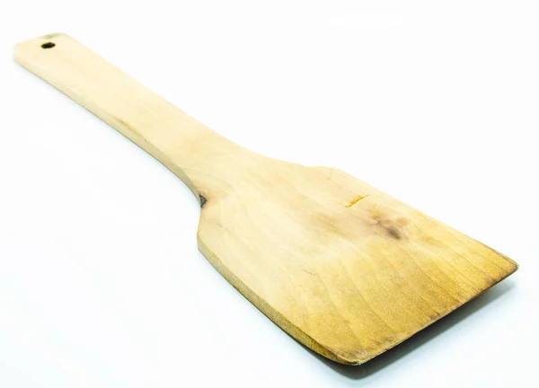 Wooden spade of frying pan on white background — Stock Photo, Image