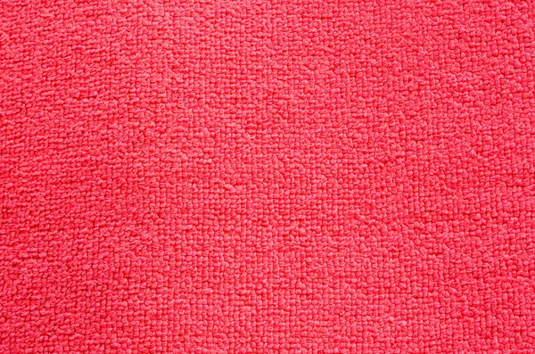 Textura de fundo de um tapete vermelho — Fotografia de Stock