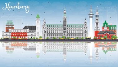 Hamburg manzarası ile gri binalar, mavi gökyüzü ve yansımaları.