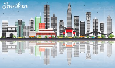 Shenzhen manzarası ile gri binalar, mavi gökyüzü ve yansımaları.