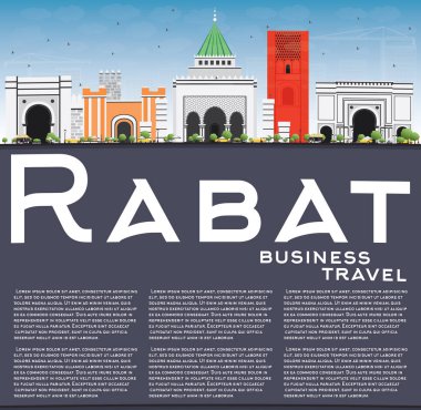 Rabat manzarası ile gri binalar, mavi gökyüzü ve yansımaları.