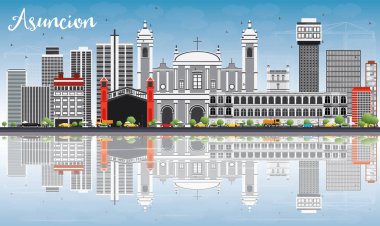 Asuncion manzarası ile gri binalar, mavi gökyüzü ve yansımaları.
