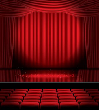 Koltuklar ve kopya alanı açık kırmızı perdeler.