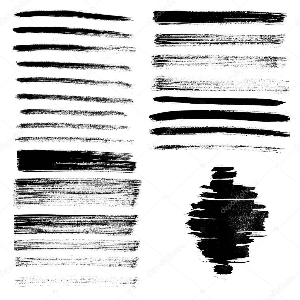 Set of different grunge brush strokes and stains.