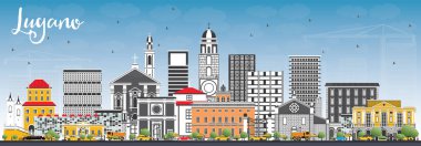 Lugano İsviçre manzarası gri binalar ve mavi gökyüzü ile.