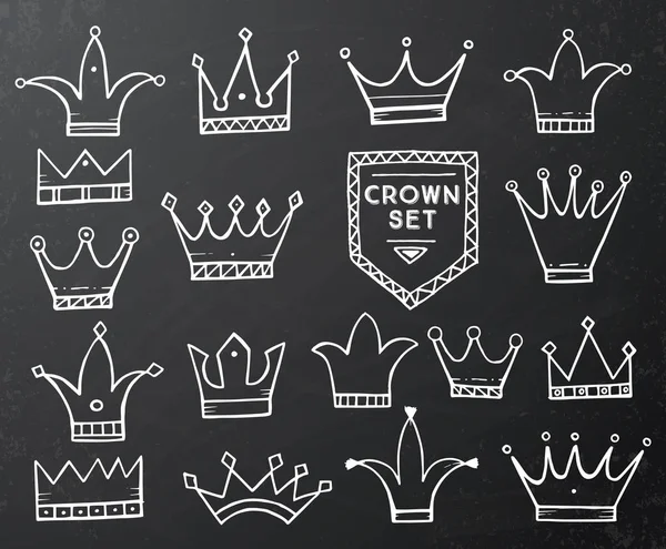 Set of Hand Drawn Cartoon Crowns on Black Chalkboard. — Stock Vector