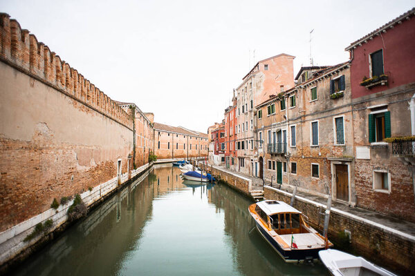 Canal Rio della Tana in Venice. Italy. Architecture and landmarks of Venice. Moored Boats.
