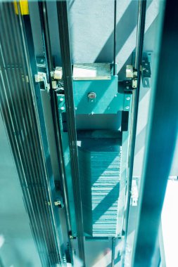 Blurred images see from inside the lift are moving. 